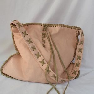 Soft pink hand made leather bag